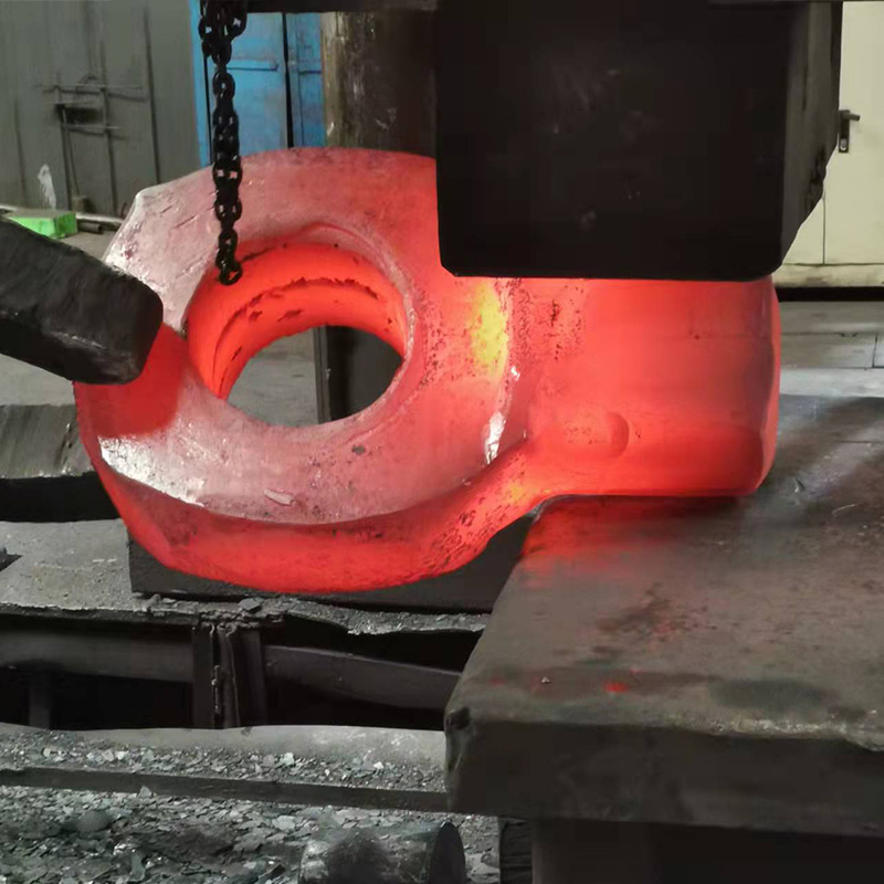 How do material selection and heat treatment affect ring type special shaped forgings
